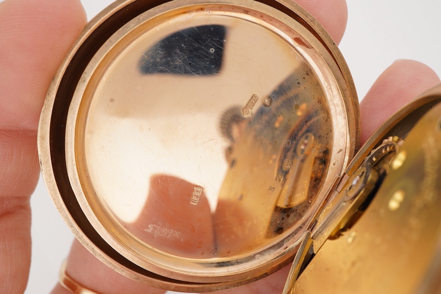 A George V 9ct gold hunter keyless lever pocket watch, by Russells Ltd of Liverpool, with Roman dial and subsidiary seconds, case diameter 48mm, gross weight 89 grams, with a leather suspension strap with rolled gold T-b